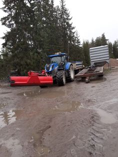 Traktori ja aurauskalustoa